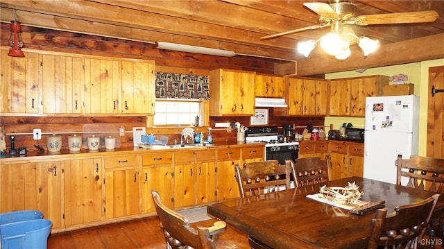 kitchen with ceiling fan, dark hardwood / wood-style floors, sink, and white appliances