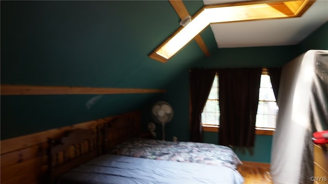 bedroom featuring vaulted ceiling