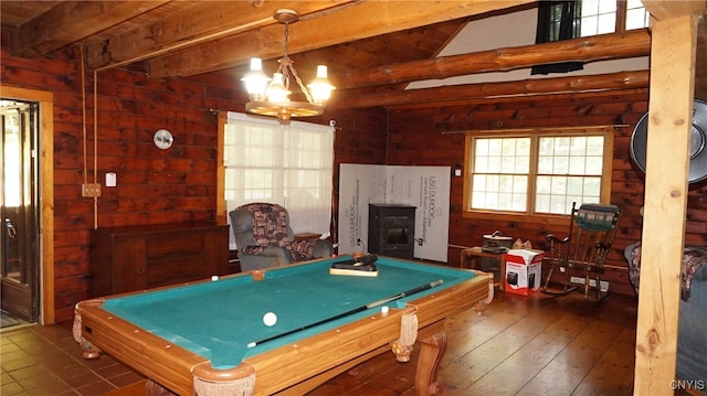 recreation room featuring dark wood-type flooring, pool table, beam ceiling, and a fireplace