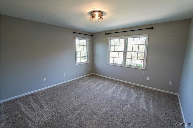 empty room with carpet floors