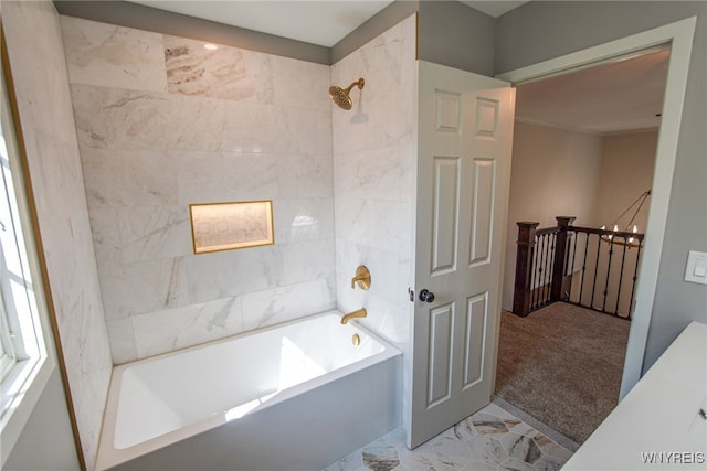 bathroom with tiled shower / bath combo