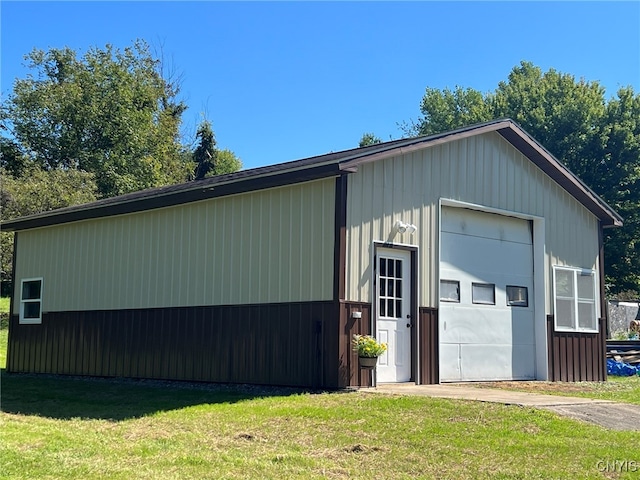 garage with a yard