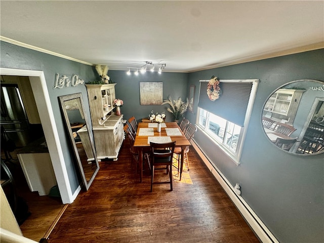 dining space featuring dark hardwood / wood-style floors and ornamental molding