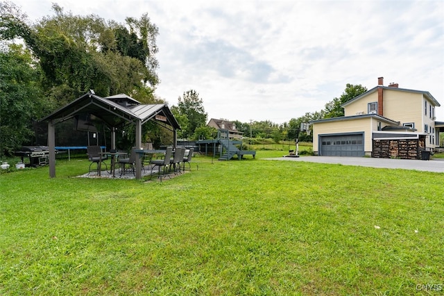 view of yard with a garage