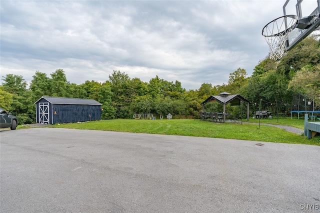 exterior space with a shed