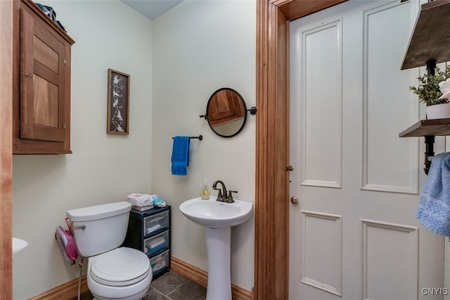 bathroom featuring toilet