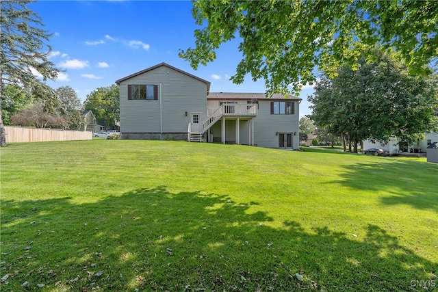 view of yard featuring a wooden deck