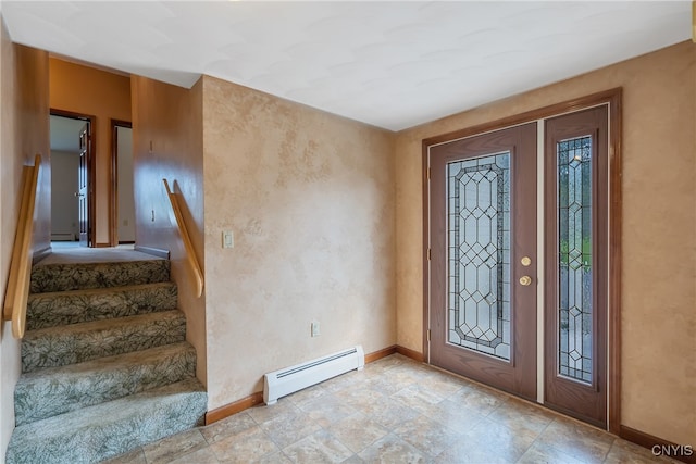 foyer featuring baseboard heating