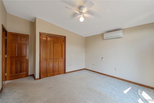 unfurnished bedroom with light colored carpet, lofted ceiling, a closet, ceiling fan, and an AC wall unit