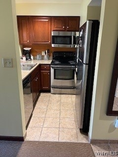 kitchen featuring sink and appliances with stainless steel finishes