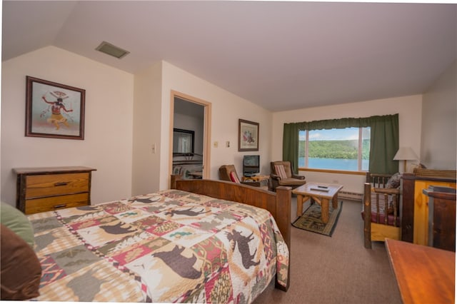 carpeted bedroom with vaulted ceiling and baseboard heating