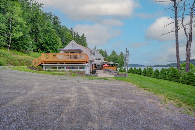 view of front of property with a deck