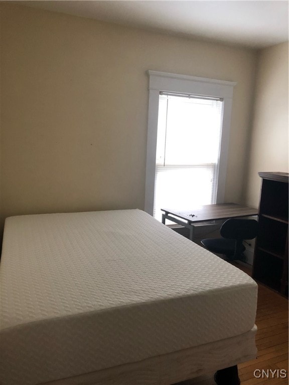 bedroom featuring hardwood / wood-style flooring