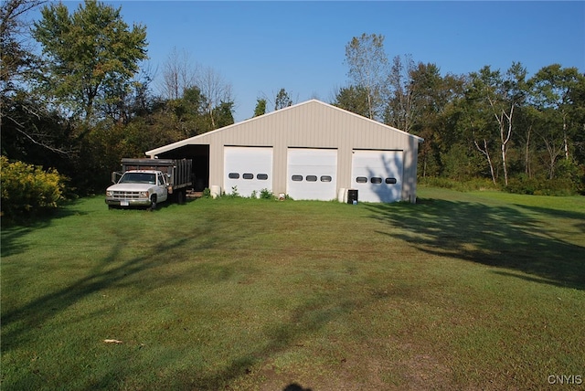 garage with a lawn