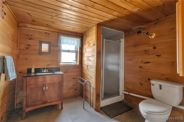 bathroom featuring a shower with door, wooden ceiling, toilet, wood walls, and vanity