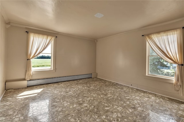 spare room featuring crown molding and baseboard heating