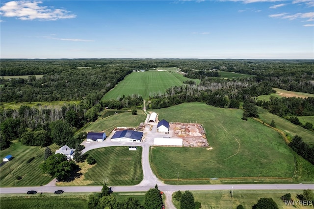 birds eye view of property featuring a rural view