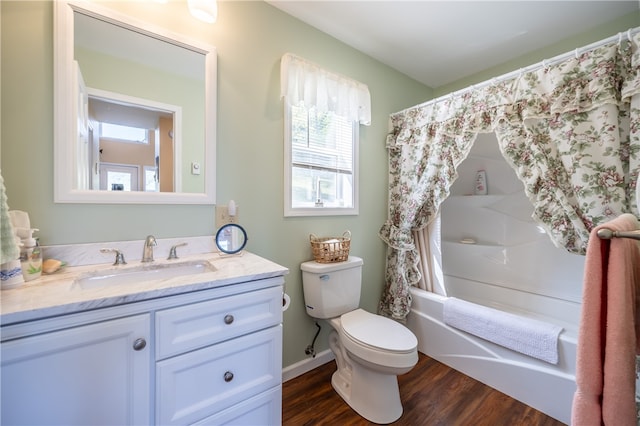 full bathroom with shower / bath combination with curtain, wood-type flooring, vanity, and toilet