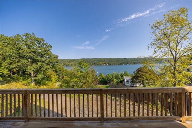 wooden deck with a water view