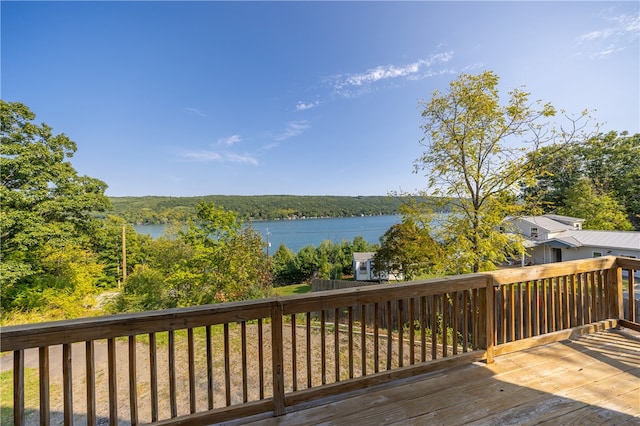 deck featuring a water view