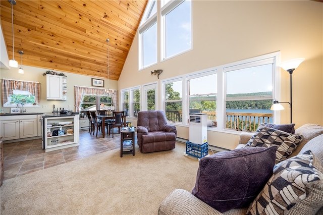 living room featuring baseboard heating, high vaulted ceiling, wooden ceiling, carpet floors, and a water view