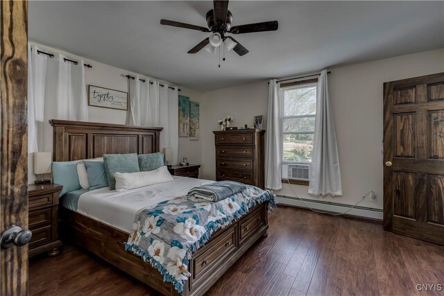 bedroom with cooling unit, a baseboard radiator, ceiling fan, and dark wood-type flooring