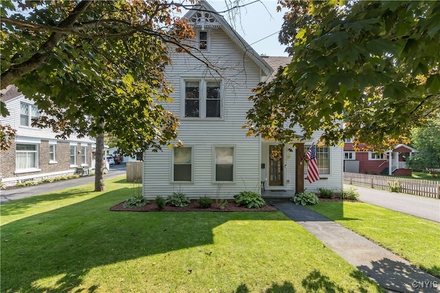 view of front facade with a front lawn