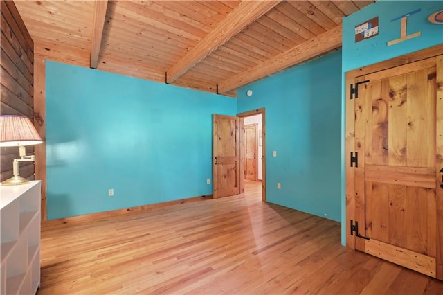 unfurnished bedroom with high vaulted ceiling, wood finished floors, beam ceiling, and wooden ceiling