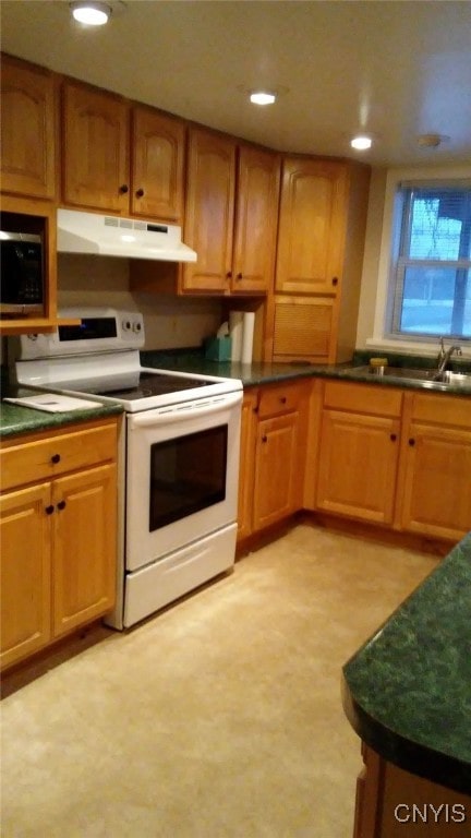 kitchen featuring electric range