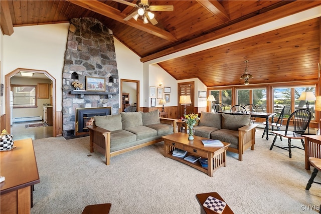 living room with light colored carpet, ceiling fan, wooden ceiling, and a fireplace