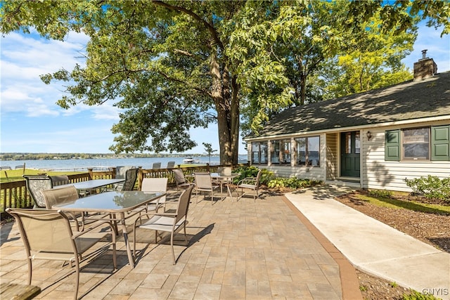 view of patio / terrace featuring a water view