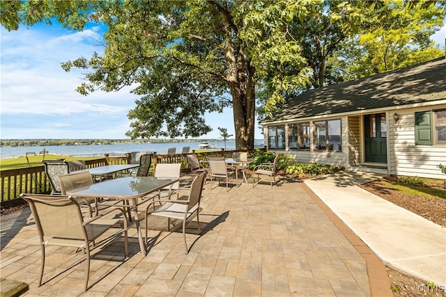 view of patio / terrace featuring a water view