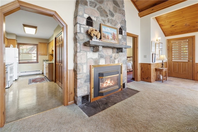 living room with a fireplace, wooden ceiling, baseboard heating, high vaulted ceiling, and beam ceiling