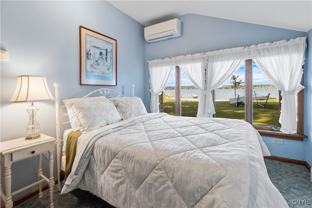 carpeted bedroom featuring multiple windows, a water view, access to exterior, and a wall mounted air conditioner