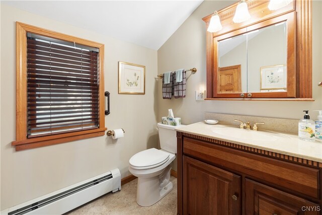 bathroom featuring vanity, lofted ceiling, toilet, and a baseboard radiator