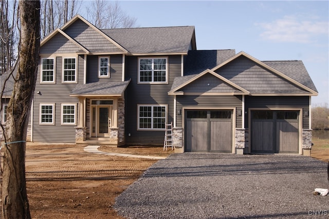 craftsman inspired home with a garage