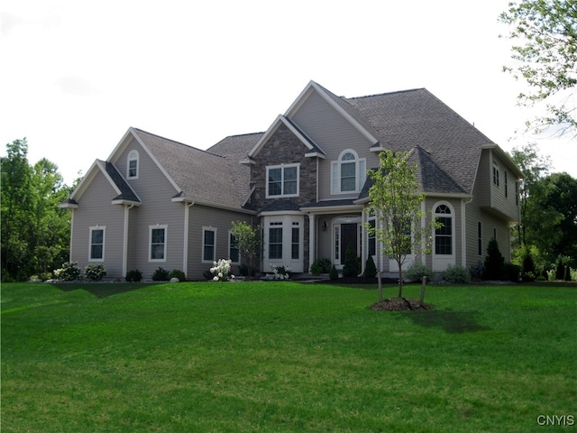 view of front facade with a front yard