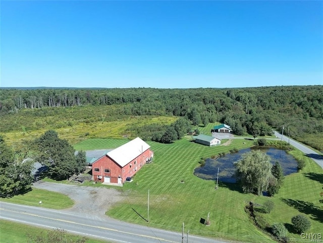 birds eye view of property with a rural view