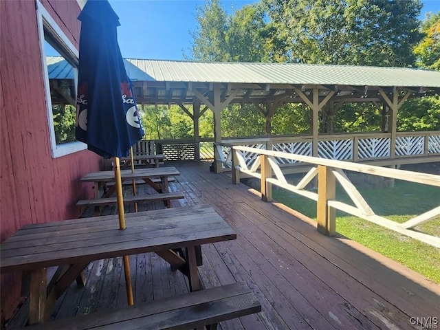 wooden terrace with a gazebo