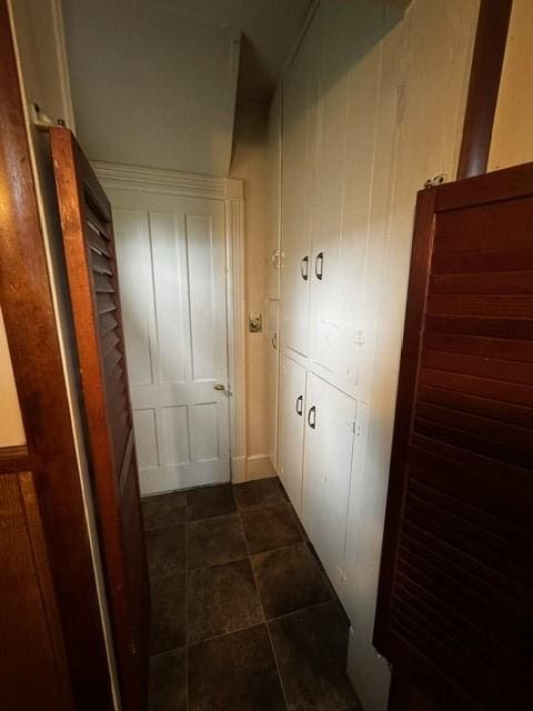87 Canasawacta St, Norwich-City, NY 13815 - hall featuring dark tile patterned flooring