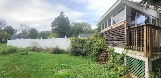 87 Canasawacta St, Norwich-City, NY 13815 - view of yard with a sunroom and fence