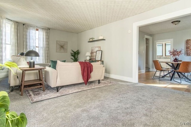 living room featuring light colored carpet