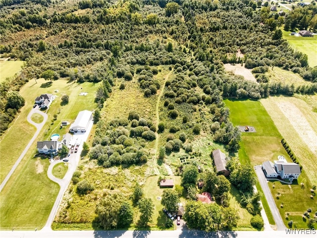 birds eye view of property featuring a rural view