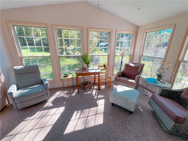 sunroom featuring vaulted ceiling