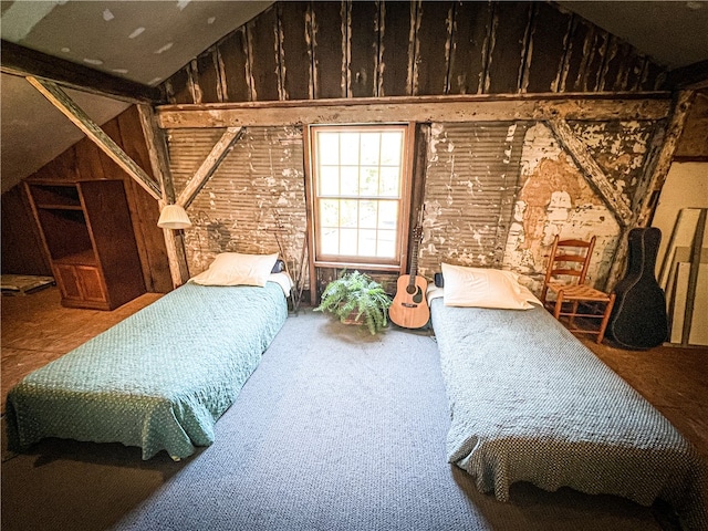 bedroom with lofted ceiling