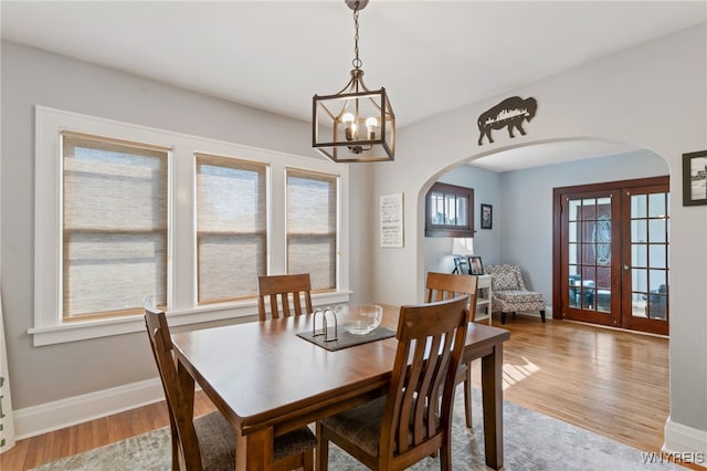 dining room featuring light hardwood / wood-style floors and a wealth of natural light