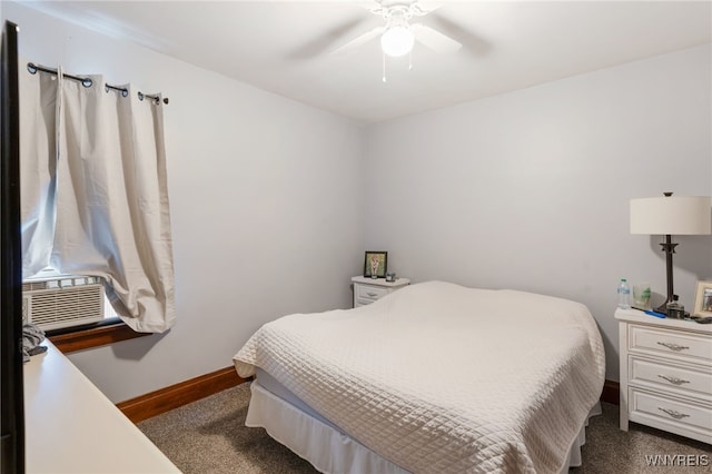 carpeted bedroom featuring ceiling fan and cooling unit