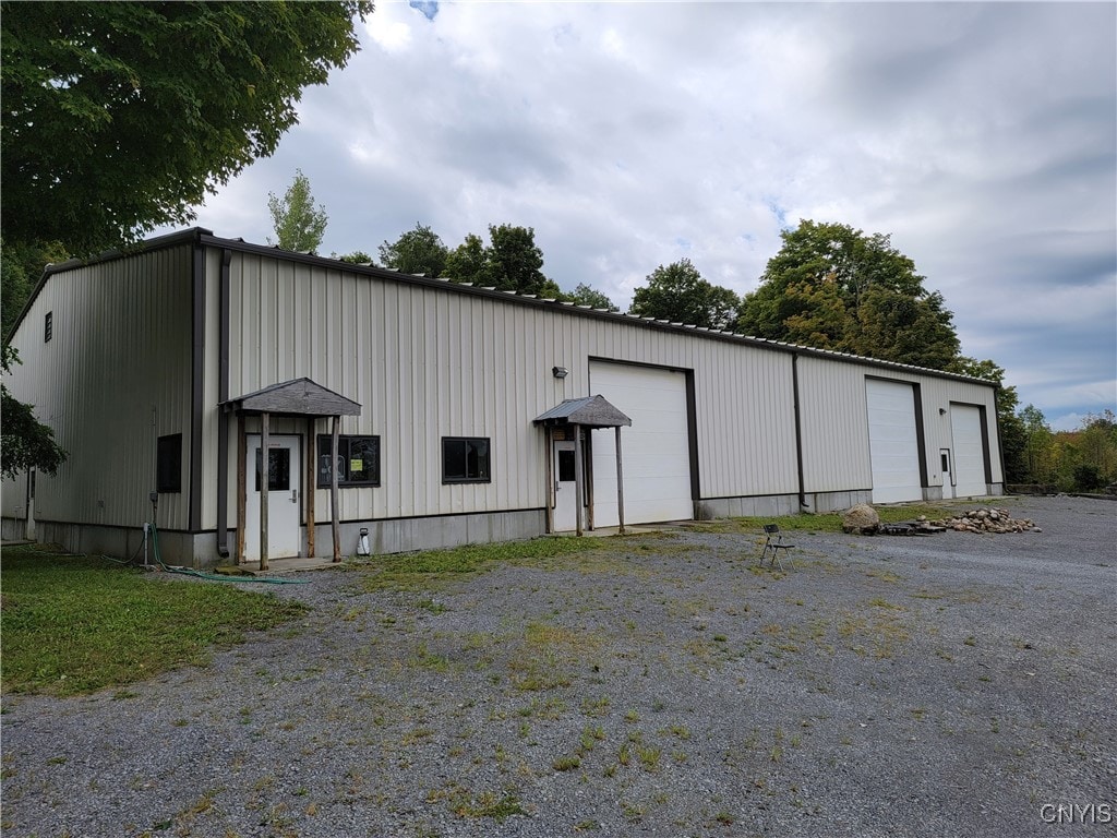 view of outdoor structure featuring a garage