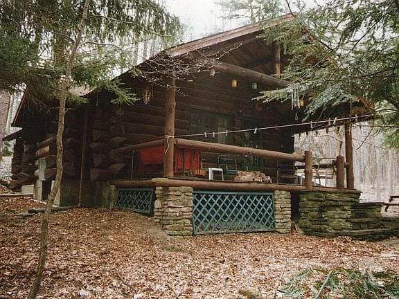 8578 County Road 49, Rushford, NY 14717 - exterior space with log exterior
