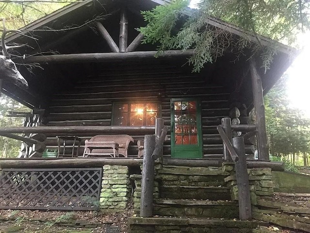 8578 County Road 49, Rushford, NY 14717 - exterior space with log exterior